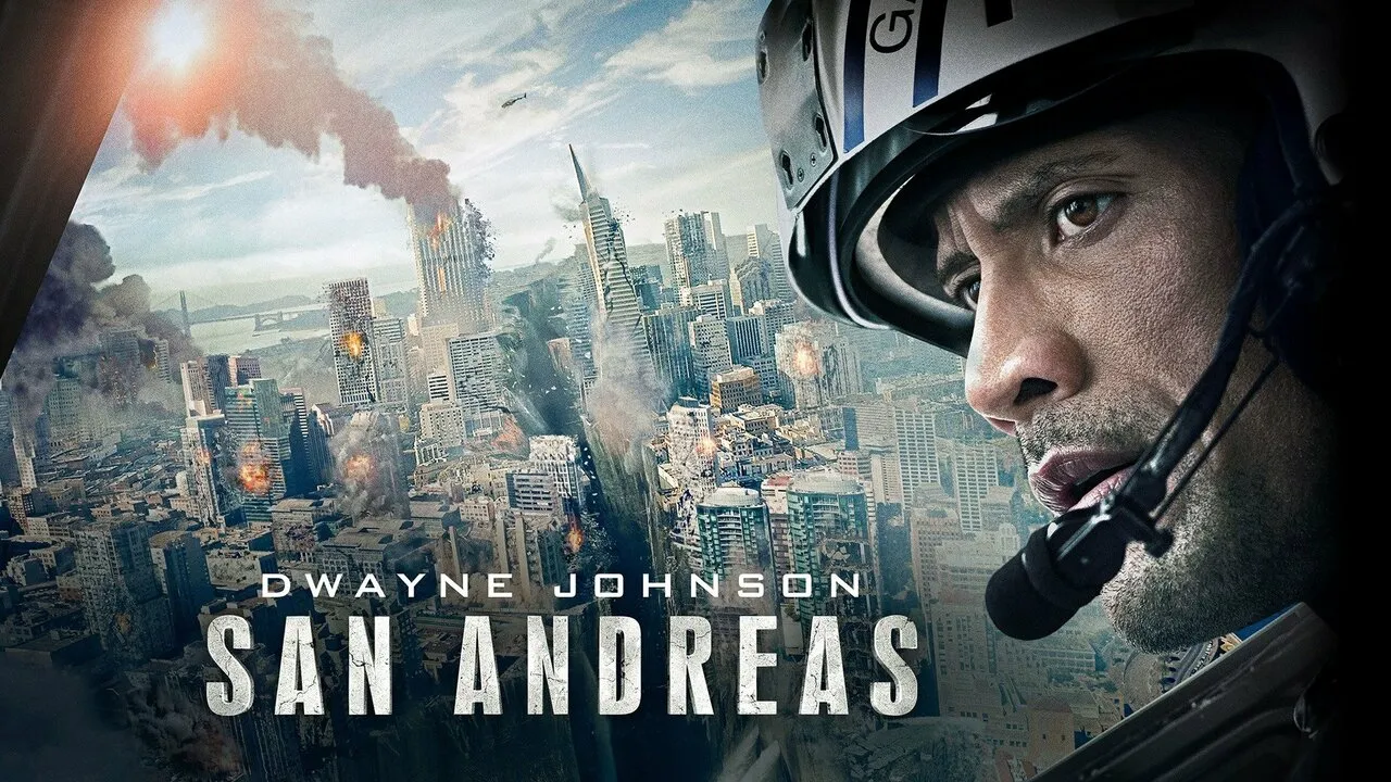 The movie poster for San Andreas, showing Dwayne Johnson flying a helicopter over a burning city. 