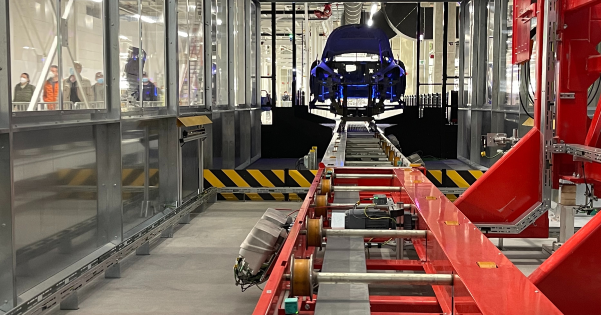 A car being built on the line. Header image for the automotive industry 2022 blog.