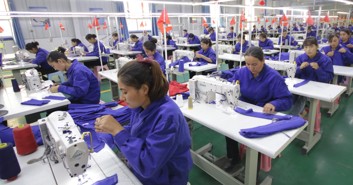 Header image for industries impacted by UFLPA. An image of workers in a textile factory.