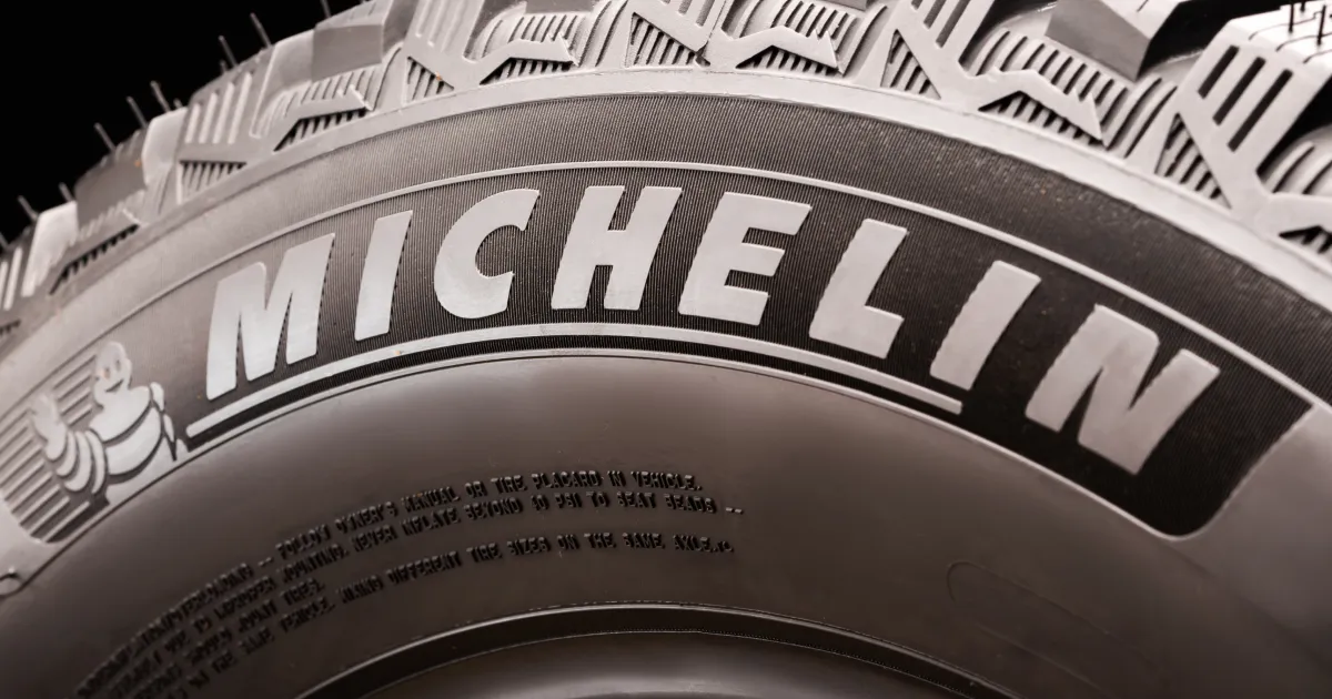 A close-up of a Micheline brand tire. 